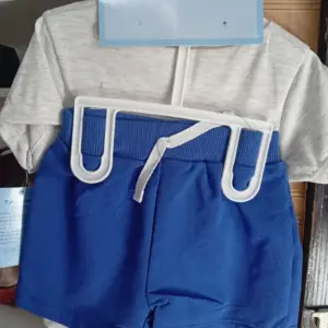A three piece baby clothing set