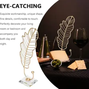 Gold leaf statue jewellery stand